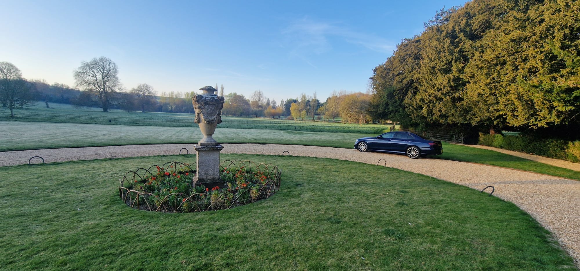 Mecedes E Class with view of countryside